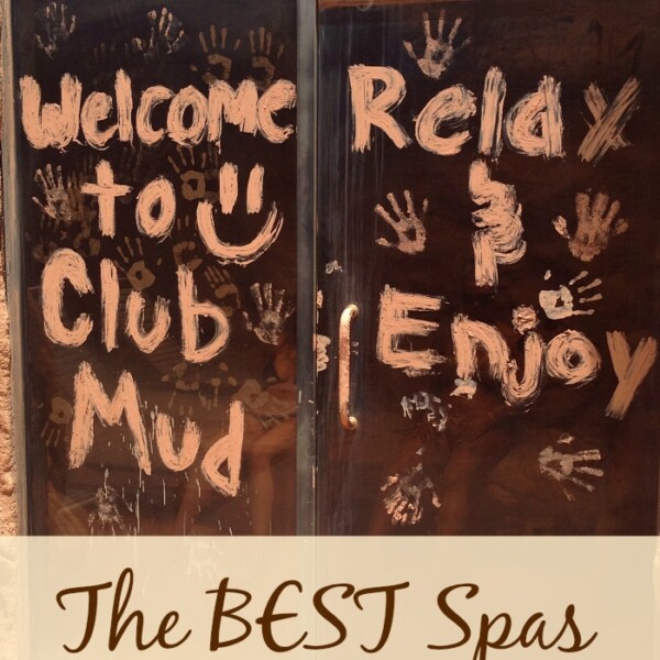 A glass door is painted with greetings, "Welcome to Club Mud" and "Relax & Enjoy," surrounded by handprints. Below, a banner proudly declares this as one of the best spas in Southern California.