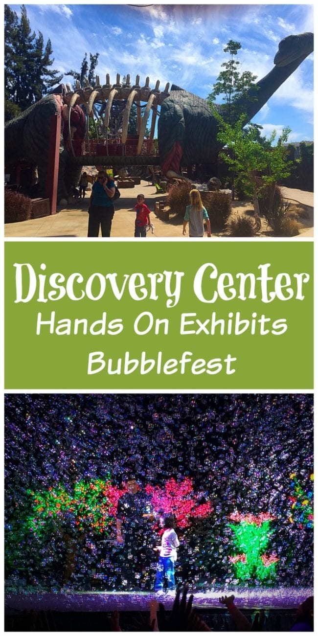 At the Discovery Science Center Santa Ana, a dinosaur sculpture and a bubblefest exhibit dazzle visitors with vibrant lights and interactive fun.