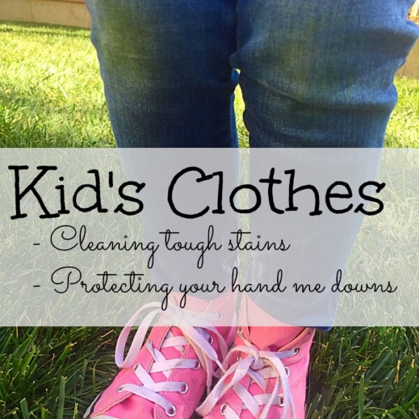 A child wearing pink sneakers and blue jeans stands on grass. Text overlay reads: Kids Clothes - Making your kids' clothes last longer - Cleaning tough stains - Protecting your hand-me-downs.