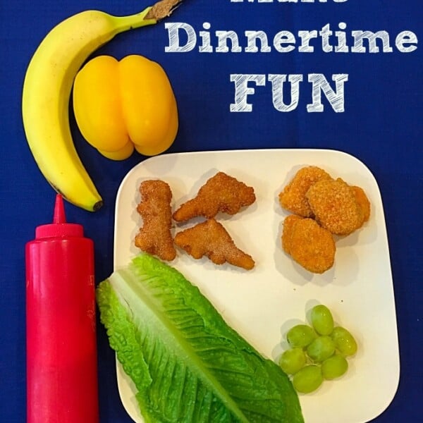 Plate with dino nuggets, grapes, and lettuce, alongside a banana, yellow pepper, and red ketchup bottle. Text reads How to Make Dinnertime Fun with Fun Food Ideas for Kids.