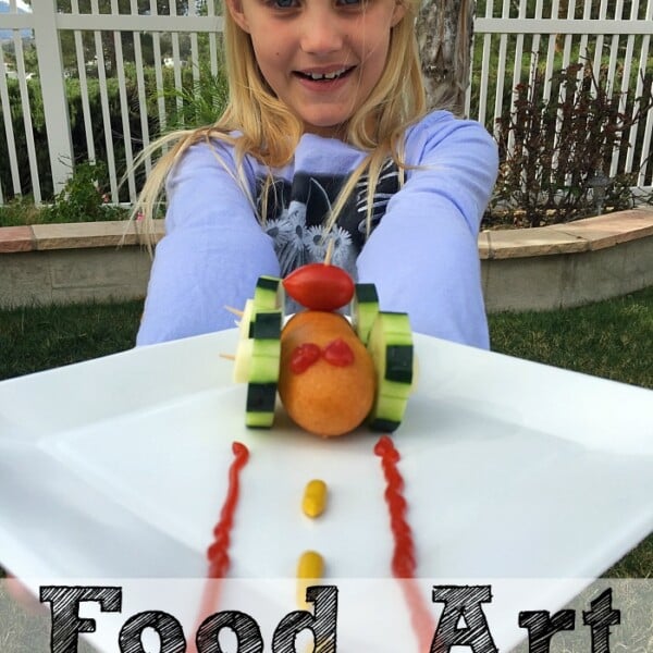 Child holding a plate with a vehicle-shaped food art made from vegetables and fruit, perfect as an easy after school snack, with Food Art for Kids text at the bottom.