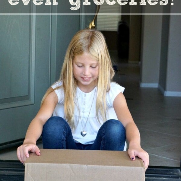 A girl sits with a delivery box on a doorstep. Text reads, "With Google Express, have everything delivered to your doorstep, even groceries!