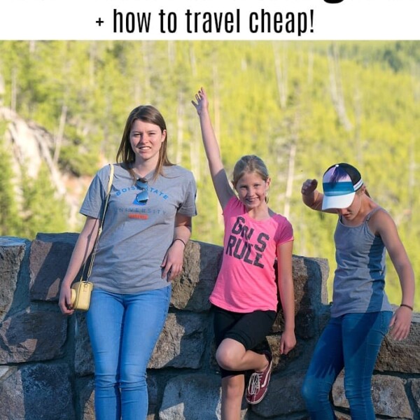 Three children pose playfully on a stone wall in a park setting with lush greenery in the background. Text at the top reads, "Best National Parks for Kids: Discover Amazing Spots for Young Explorers + How to Travel Cheap!