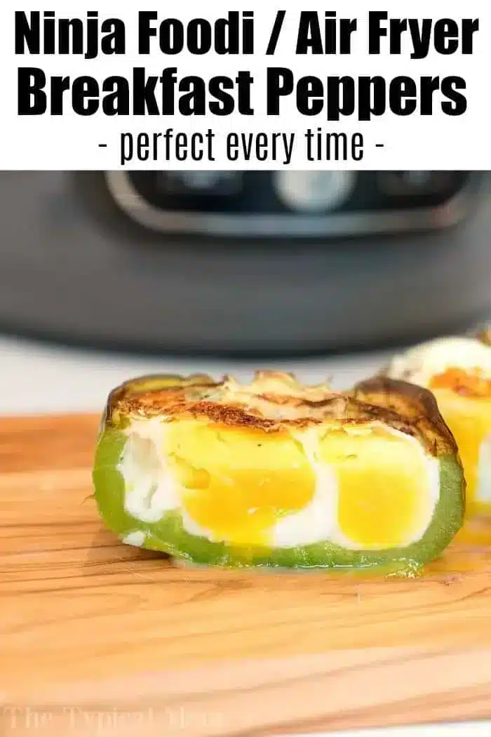 A slice of green bell pepper stuffed with fluffy cooked egg, lightly browned on top, rests on a wooden surface. The text at the top reads, "Air Fryer Breakfast Stuffed Peppers - perfect every time.