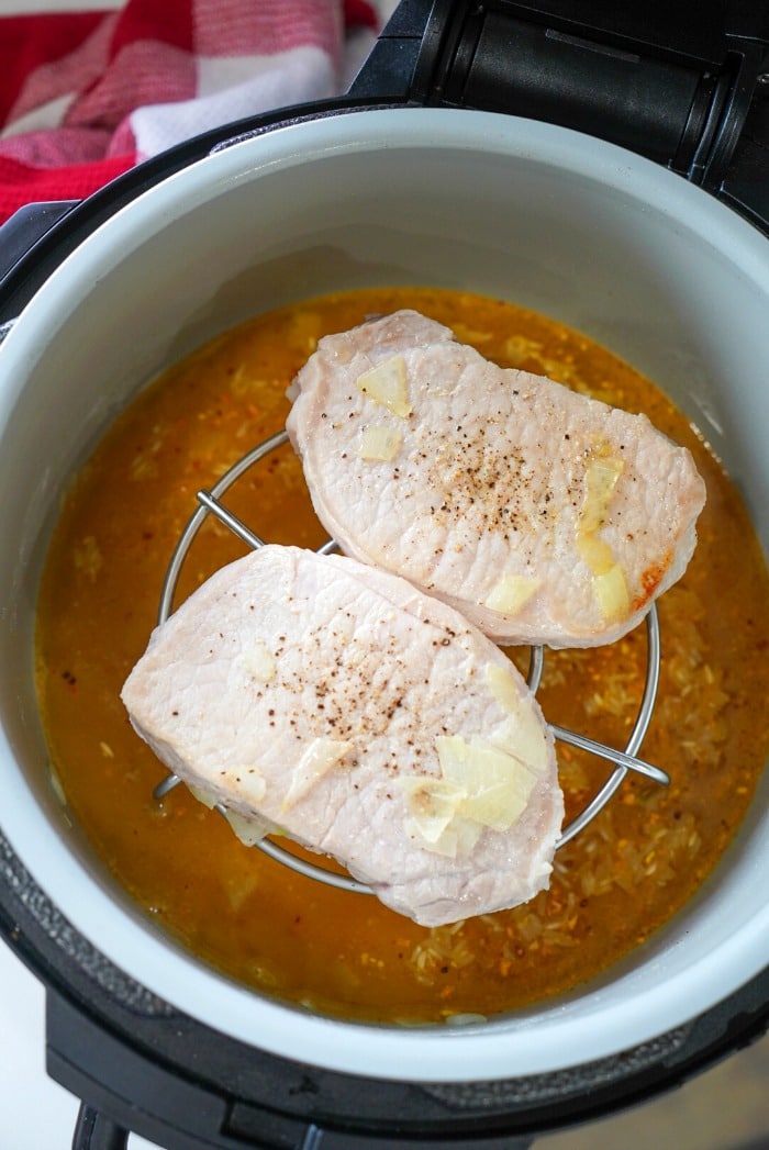 Ninja Foodi Pork Chops and Rice Pressure Cooker Pork Chops