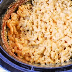 Crockpot Macaroni and Cheese with Evaporated Milk is a delightful dish, featuring creamy, melted cheese perfectly coating the pasta in a slow cooker.