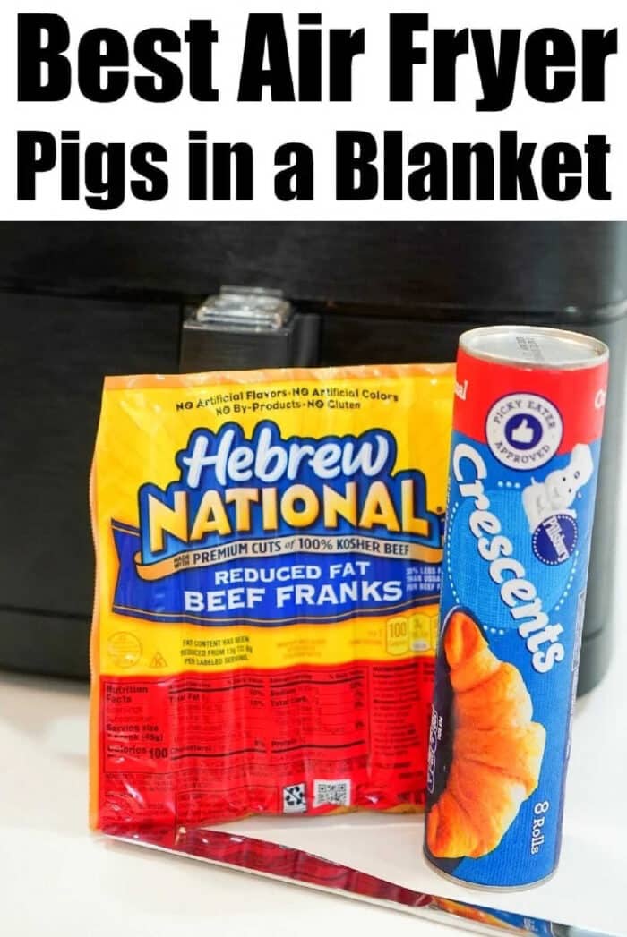 Air fryer pigs in a blanket are my kids favorite snacks! Easy recipe to make with crescent rolls and hot dogs that turns out crunchy to perfection every time. A package of Hebrew National beef franks and a can of Pillsbury crescent rolls sit in front of an air fryer, ready to make delicious air fryer pigs in a blanket.