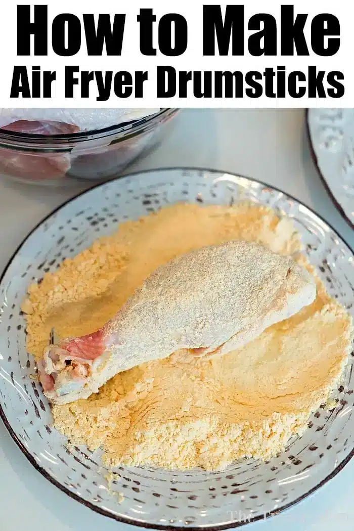 A raw chicken drumstick coated in a breading mixture is placed on a white plate with a black pattern. The text above the image reads "How to Make Air Fryer Fried Chicken Drumsticks.