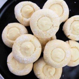 A delightful plate of lemon cookies from cake mix, each with a luscious white chocolate center.