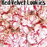 A pile of Red Velvet Crinkle Cookies coated in powdered sugar is pictured. The text at the top reads "Cake Mix Red Velvet Cookies." The cookies have a cracked appearance, with red velvet showing through the white powdered sugar.