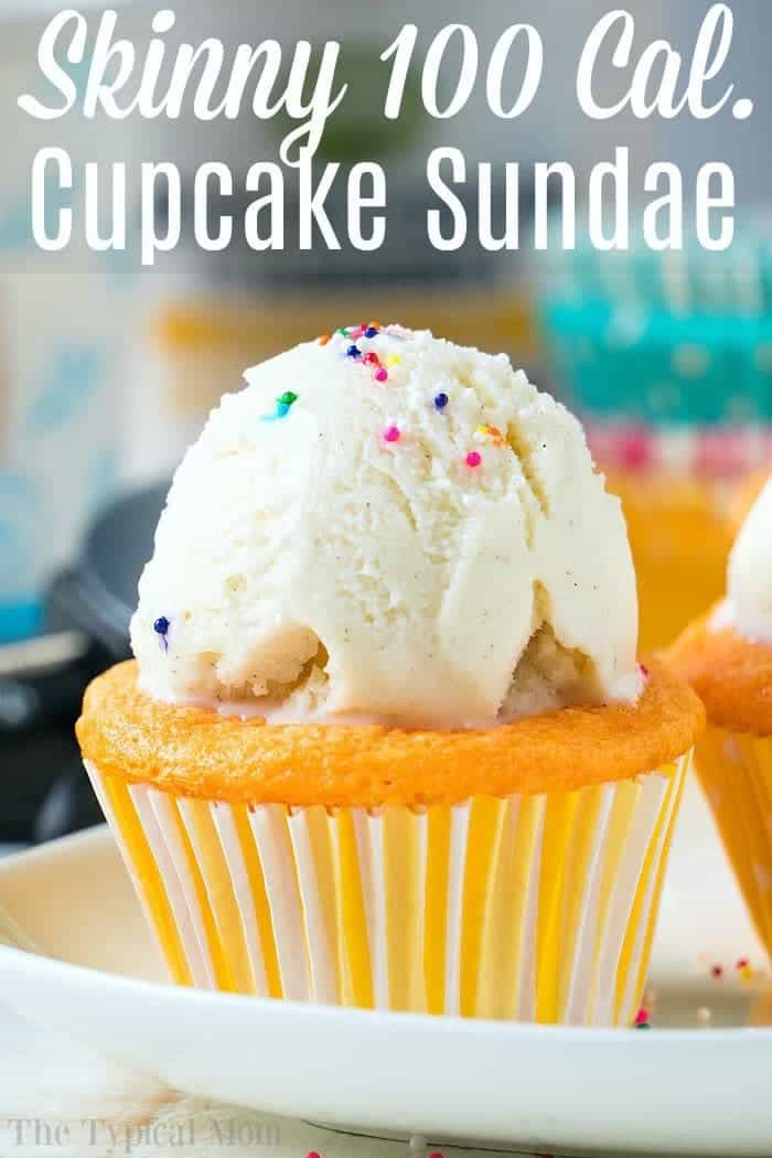 Close-up of a cupcake made from a 2 ingredient soda cake, topped with a scoop of vanilla ice cream and colorful sprinkles. Text on the image reads "Skinny 100 Cal. Cupcake Sundae.