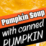 Close-up of creamy Pumpkin Soup with Canned Pumpkin, topped with a swirl of cream and served with a spoon. Warm, comforting, and easy to make—perfect for cozy nights in.