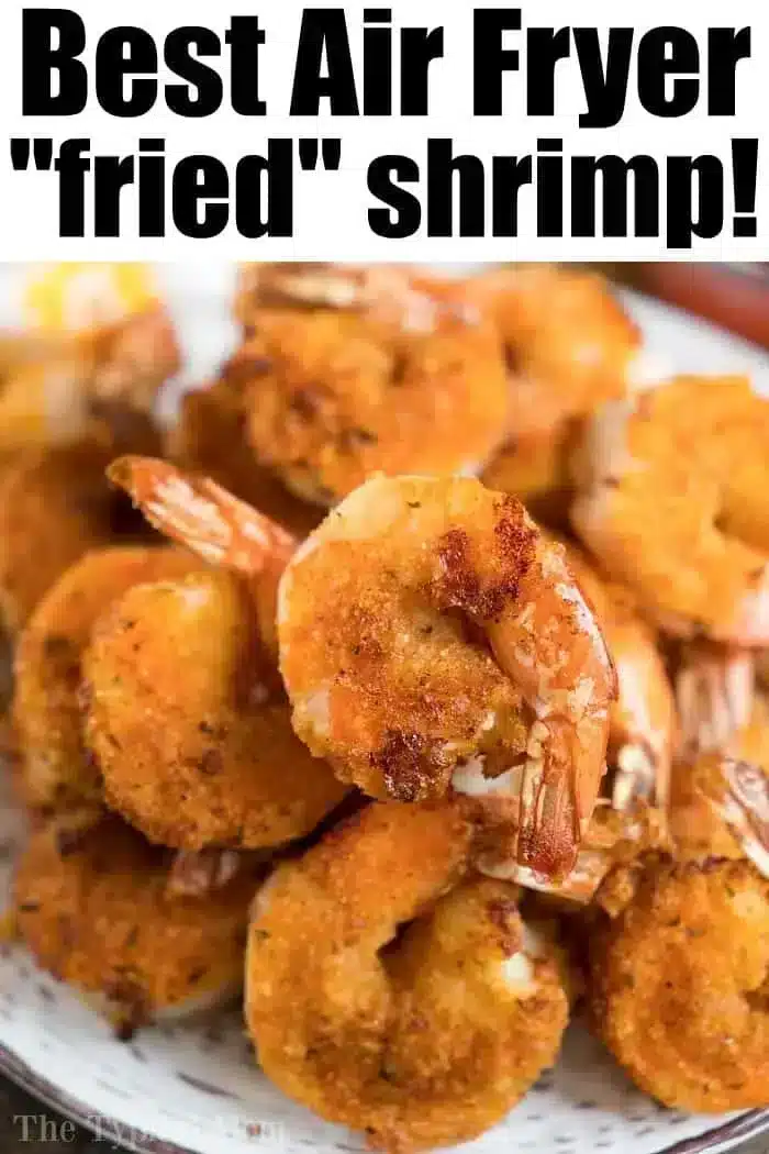 A close-up of a plate filled with breaded and cooked shrimp. The text at the top says, "Best Air Fryer Bang Bang Shrimp!" The shrimp appear crispy and golden brown.