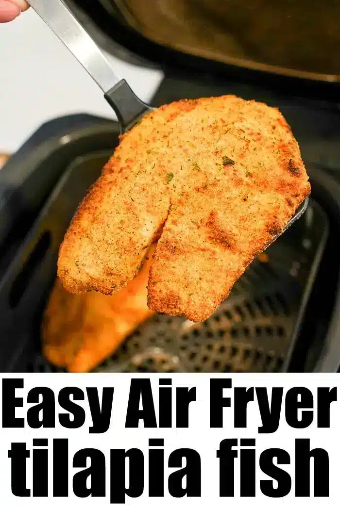 A piece of breaded tilapia fish is held above an air fryer basket by a spatula, showcasing the deliciousness of air fryer tilapia. The text "Easy Air Fryer tilapia fish" is displayed at the bottom of the image.