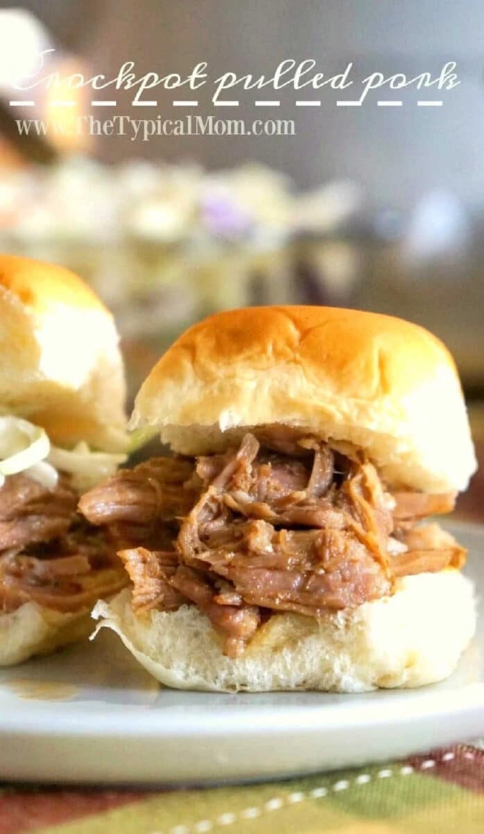 A pulled pork sandwich made from slow-cooked, tender cooking pulled pork sits on a soft bun, ready to eat.
