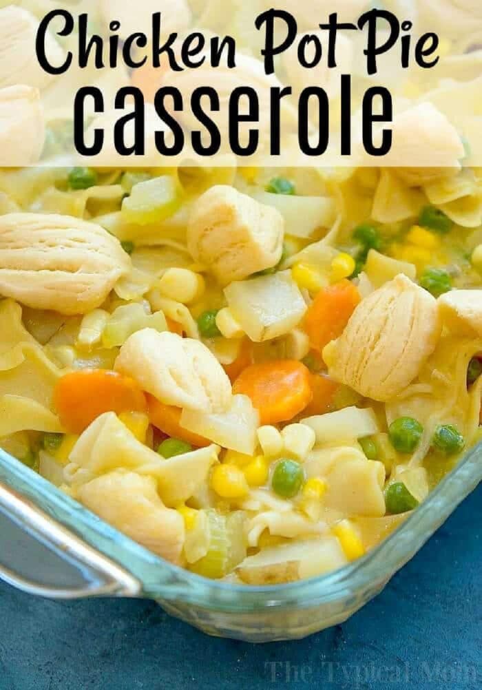 Easy chicken pot pie casserole my whole family loves! Total comfort food made casserole style loaded with chicken and vegetables with a retro style crust. #chicken #potpie #casserole #chickenpotpie Easy chicken pot pie casserole with vegetables, noodles, and biscuit pieces baked together in a glass dish.