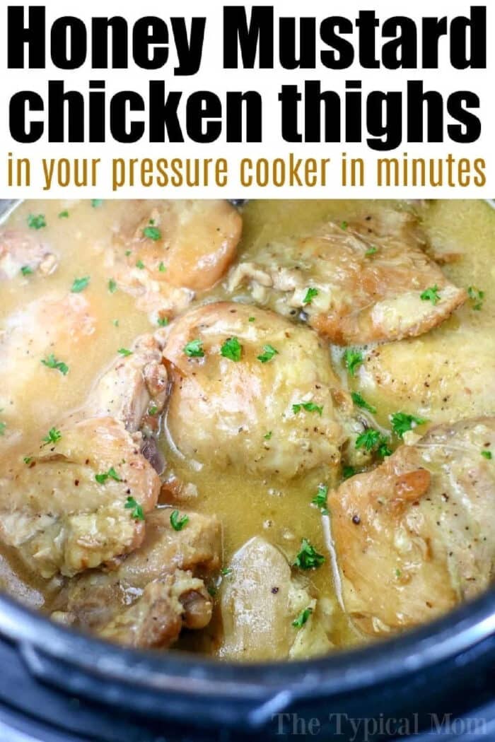 Honey mustard chicken is so simple! A one pot meal you can throw into your Instant Pot and have a healthy meal done in less than 20 minutes. #instantpot #pressurecooker #chicken #honeymustard #instantpotrecipes #chickenthighs #ninjafoodi #thetypicalmom Instant Pot Honey Mustard Chicken thighs are cooked in a pressure cooker with a sweet and tangy sauce, then garnished with chopped parsley.
