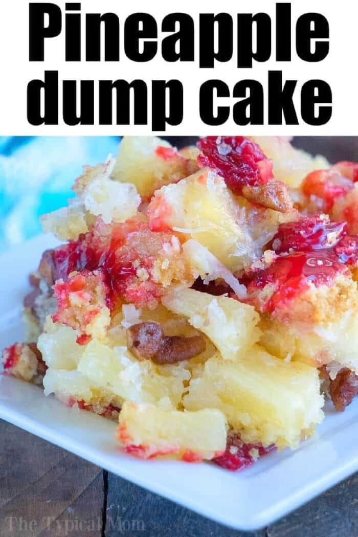 This easy cherry pineapple dump cake recipe turns out amazing! A fruit dessert with only 4 main ingredients and you can add to it like coconut and nuts too. #pineapple #cherry #dumpcake #cake #cake #coconut #dessert A close-up of cherry pineapple dump cake with white cake mix, featuring juicy pineapple chunks and cherry topping on a white plate.