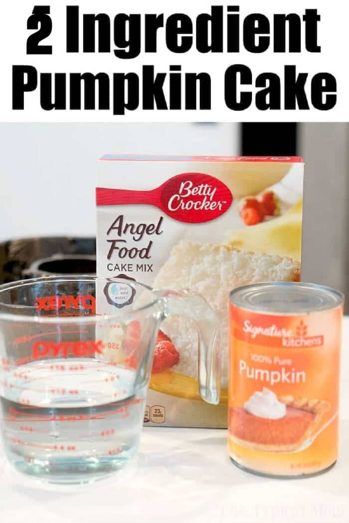 Box of angel food cake mix, a can of pumpkin, and a measuring cup of water sit on the counter&mdash;ingredients ready to make a delicious pumpkin angel food cake.