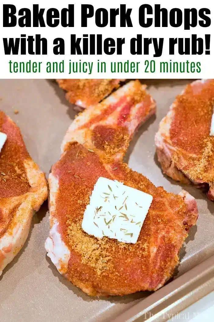 Raw pork chops with a dry rub seasoning are on a baking sheet. Each chop has a pat of butter and herbs on top, showcasing the best baked pork chops. The text above reads: "Baked Pork Chops with a killer dry rub! Tender and juicy in under 20 minutes.