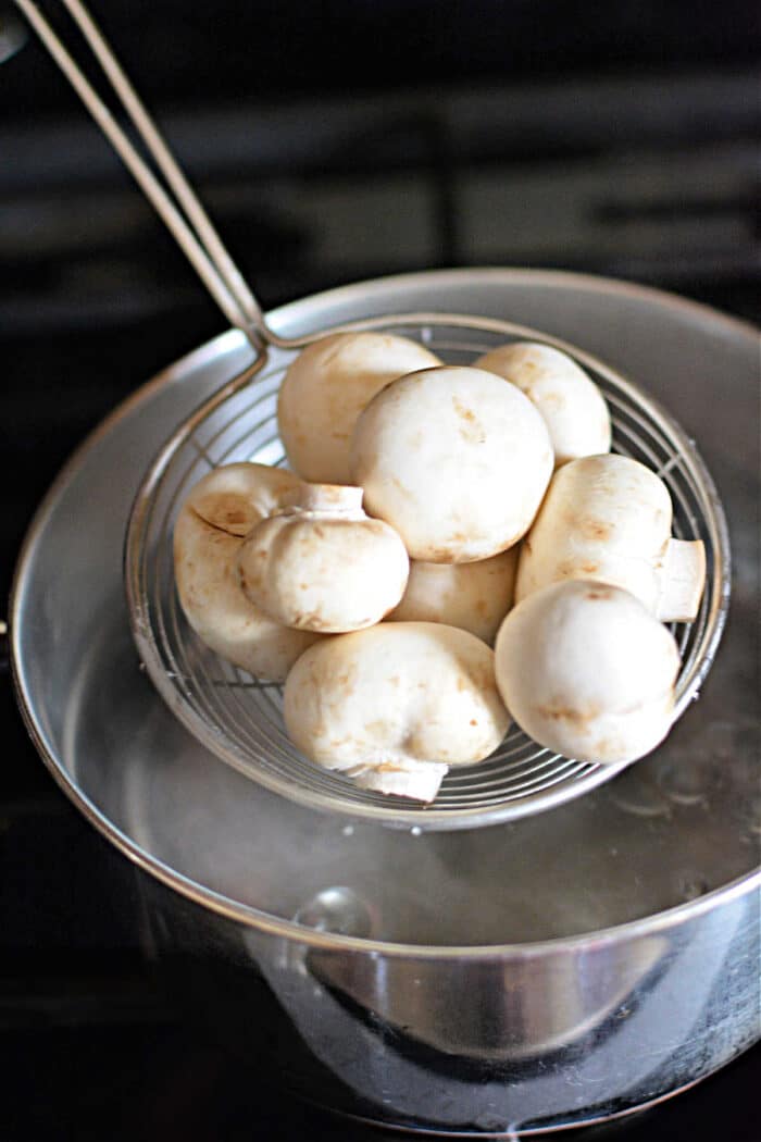 boiling mushrooms on stove