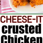 Two pieces of crispy Air Fryer Cheese It Chicken Tenders rest on a plate above an air fryer filled with more golden, cheesy chicken inside.