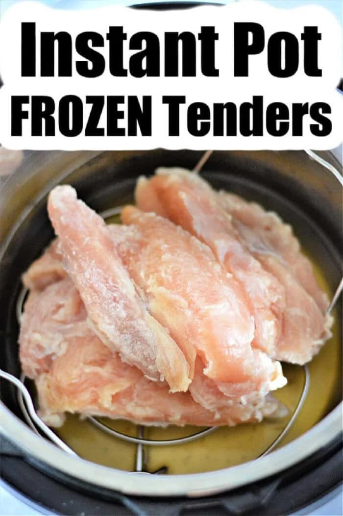 Frozen chicken tenders are stacked in an Instant Pot with broth at the bottom for easy, flavorful cooking.