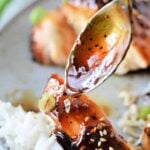 Teriyaki sauce marinade in a bowl with ingredients like soy sauce, ginger, and garlic