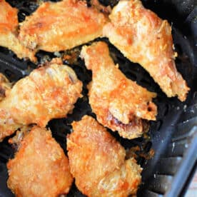 Crispy Air Fryer Chicken Wings made with a touch of baking powder, perfectly cooked in an air fryer basket.