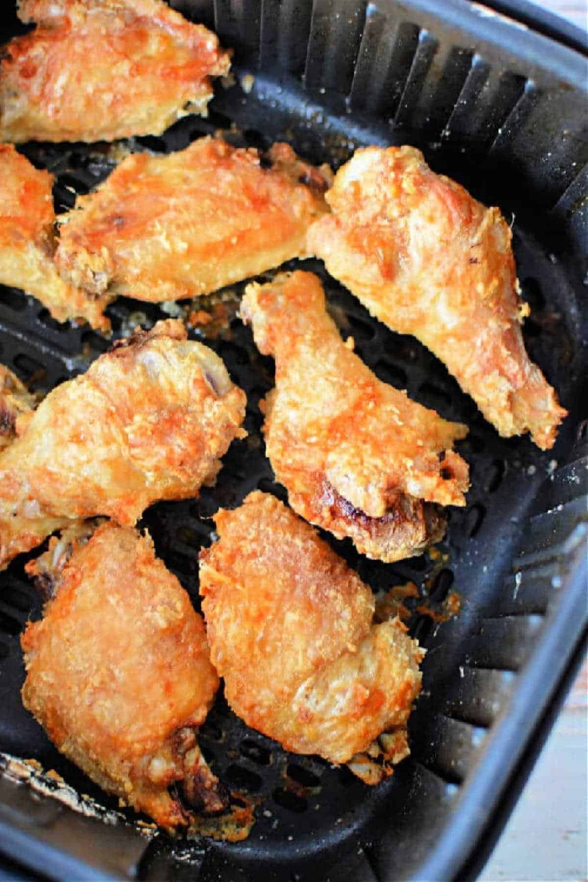 Crispy Air Fryer Chicken Wings made with a touch of baking powder, perfectly cooked in an air fryer basket.