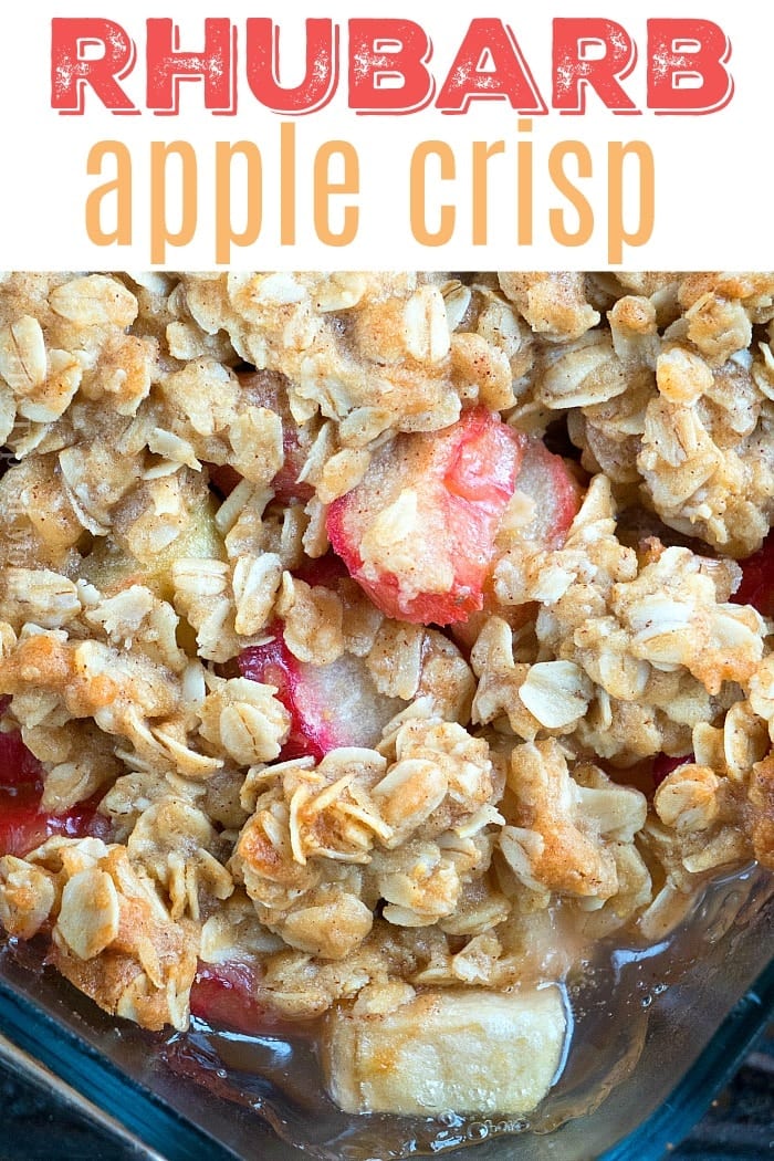 This apple rhubarb crunch dessert is amazing! Using fresh or frozen fruit with an oatmeal crisp topping it's great for brunch, breakfast or a light dessert. #rhubarb #crisp #desserts #dessert #crisp #crunch #apple #oatmeal A close-up of rhubarb apple crisp with oat topping, showcasing pieces of rhubarb and apple underneath—this delicious dessert is reminiscent of a classic rhubarb crunch.