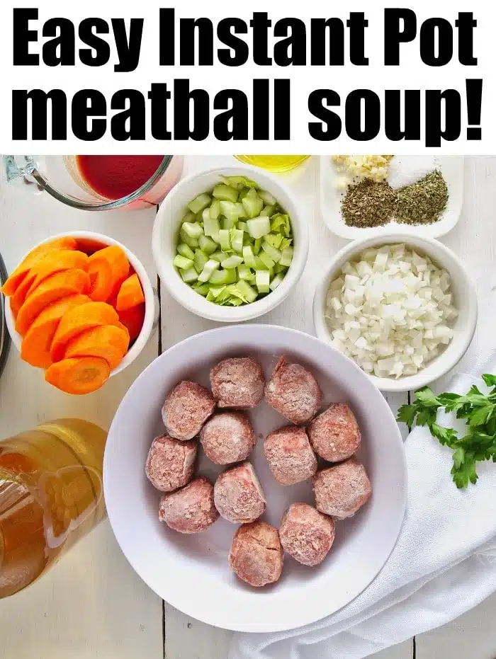 Best Instant Pot meatball soup made with homemade or frozen meatballs in under 20 minutes flat! A healthy low carb and keto friendly dinner you'll love. #instantpot #instantpotsoup #meatballsoup #keto #lowcarb #thetypicalmom #instantpotrecipes Ingredients for Instant Pot meatball soup, including savory meatballs, chopped veggies, broth, and seasonings, are displayed on a white table.