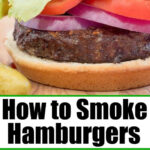 A smoked hamburger made with our signature smoked burgers recipe, topped with lettuce, tomato, onion, and pickles on a bun—shown both whole and cut in half.