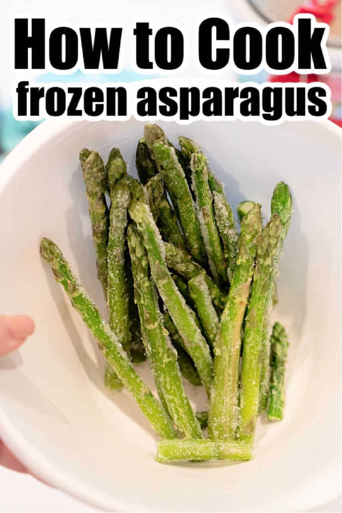 A hand holds a bowl of frozen asparagus spears, with text above that reads How to Cook Frozen Asparagus.