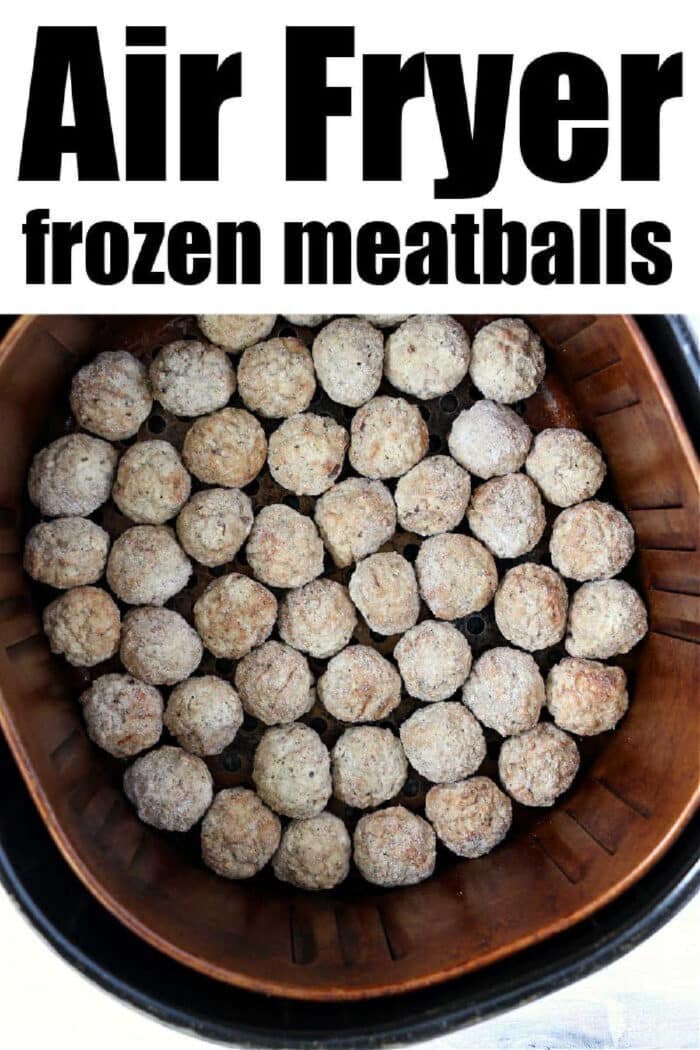 Frozen meatballs in air fryer basket, arranged in a single layer and ready to cook for quick, delicious results.