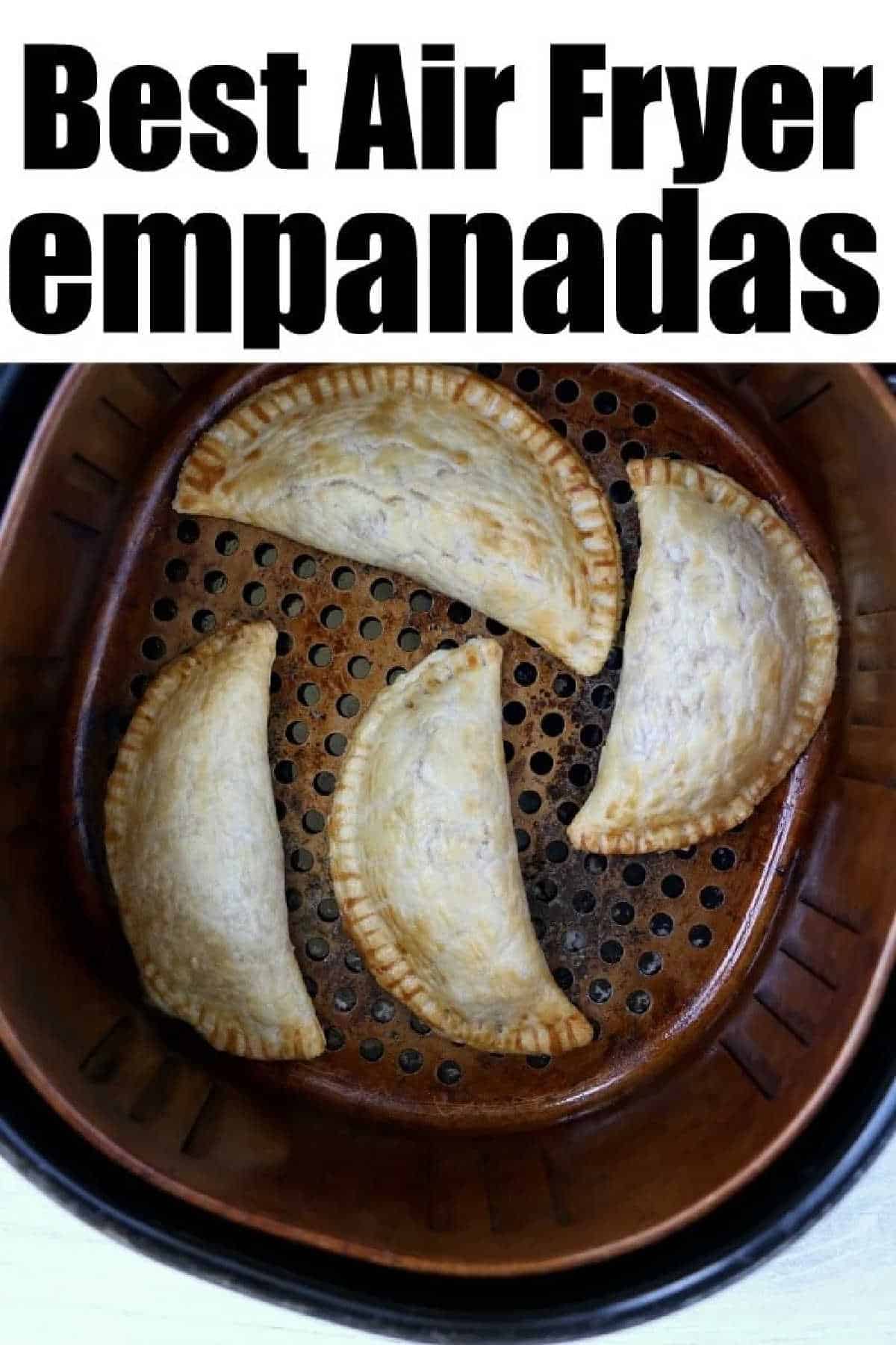 Four delicious air fryer empanadas cooking perfectly in the basket; text reads Best Air Fryer Empanadas.