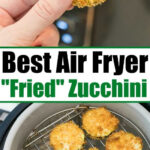 A hand holds a crispy air fryer zucchini chip; more zucchini slices are air frying in a basket below.