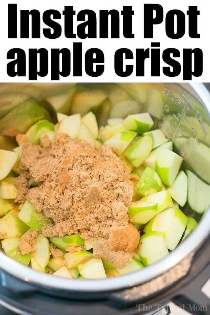This Instant Pot apple crisp recipe is amazing! Tastes like copycat Cracker Barrel baked apples we love but made in less than 20 minutes total. Warm cinnamon apples coated with a ooey gooey brown sugar glaze your family will go crazy over for sure. Try this homemade pressure cooker fruit dessert this week! #instantpot #pressurecooker #apples #applecrisp #baked #dessert #pie Sliced green apples and brown sugar in an Instant Pot—everything you need to start your instant pot apple crisp.