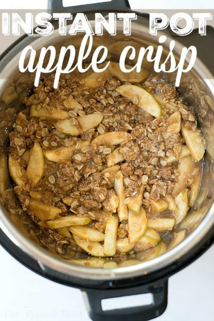 This Instant Pot apple crisp recipe is amazing! Tastes like copycat Cracker Barrel baked apples we love but made in less than 20 minutes total. Warm cinnamon apples coated with a ooey gooey brown sugar glaze your family will go crazy over for sure. Try this homemade pressure cooker fruit dessert this week! #instantpot #pressurecooker #apples #applecrisp #baked #dessert #pie Sliced apples and oat crumble are cooked together to create a delicious instant pot apple crisp, shown freshly made and labeled as Instant Pot apple crisp.