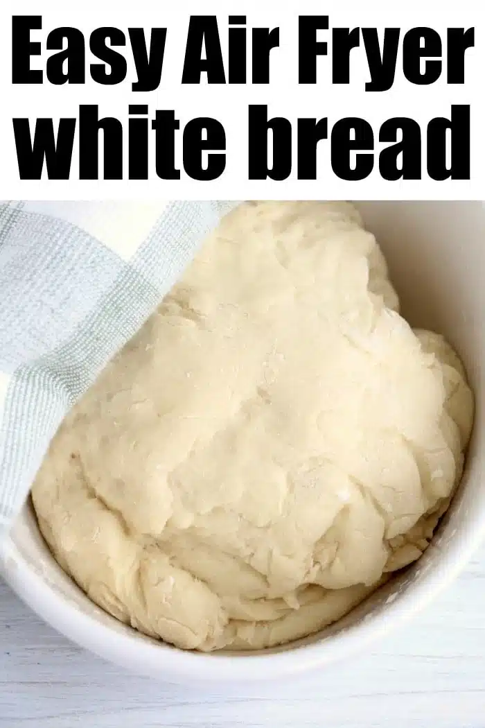 A bowl of white bread dough covered with a cloth, with text reading Easy Air Fryer Bread&mdash;perfect for quick and delicious homemade loaves.