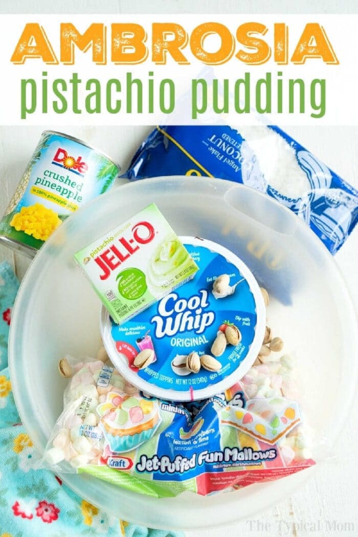 Pistachio pudding ambrosia is an amazing side dish or dessert! A cross between your favorite pistachio pudding and marshmallow ambrosia, you'll love it too. #pistachiopudding #ambrosia #dessert #marshmallow #pistachio #sidedish #thanksgiving Ingredients for pistachio pudding ambrosia: Cool Whip, Jell-O, pineapple, coconut, marshmallows, and pistachio mix.